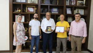 BAŞKAN POSBIYIK’A, MESLEKTE 50 YIL ONUR BELGESİ VE PLAKETİ 