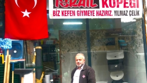 RİZELİ ESNAF BARBAR İSRAİL’E TEPKİSİNİ İŞ YERİNE PANKART ASARAK LANETLEDİ